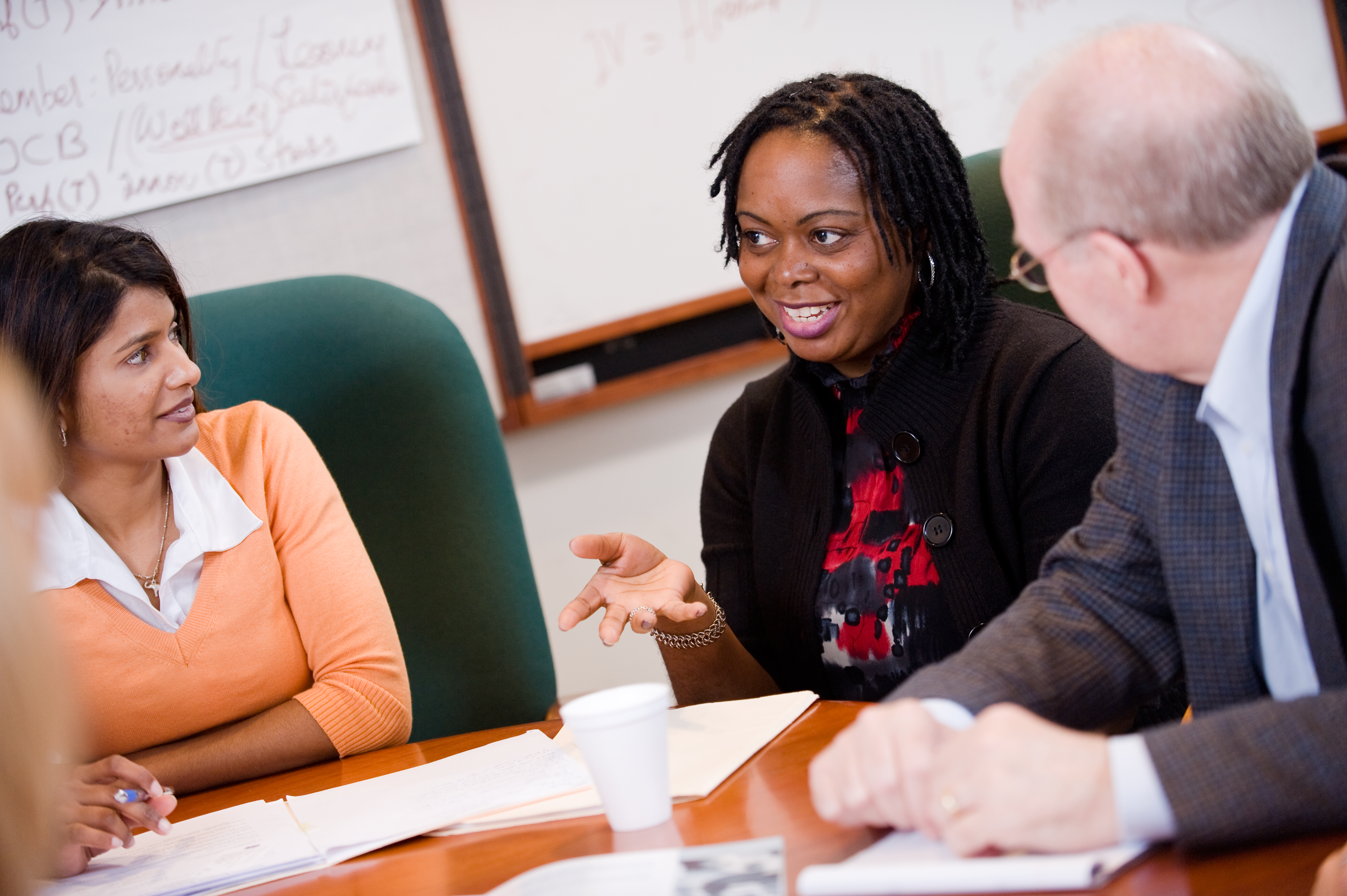 A staff meeting at Personnel Services.